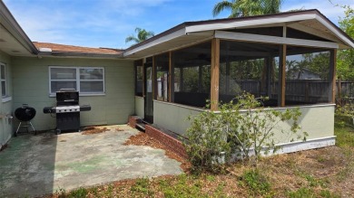 This home is located in Dana Shores - a very popular waterfront on Rocky Point Golf Course in Florida - for sale on GolfHomes.com, golf home, golf lot