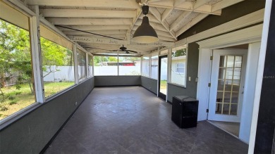 This home is located in Dana Shores - a very popular waterfront on Rocky Point Golf Course in Florida - for sale on GolfHomes.com, golf home, golf lot
