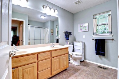 4th bedroom with 3rd full bathroom in walk-out basement on Bella Vista Country Club and Golf Course in Arkansas - for sale on GolfHomes.com, golf home, golf lot