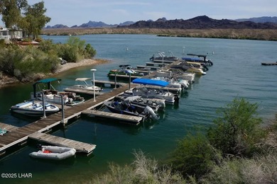 Up-close panoramic lake views right from your front patio inside on London Bridge Golf Course in Arizona - for sale on GolfHomes.com, golf home, golf lot