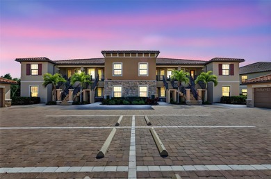 FULL GOLF MEMBERSHIP INCLUDED. PREMIER END UNIT CONDOMINIUM ON on Esplanade Golf and Country at Lakewood Ranch in Florida - for sale on GolfHomes.com, golf home, golf lot