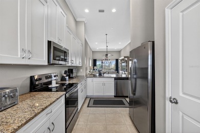 FULL GOLF MEMBERSHIP INCLUDED. PREMIER END UNIT CONDOMINIUM ON on Esplanade Golf and Country at Lakewood Ranch in Florida - for sale on GolfHomes.com, golf home, golf lot