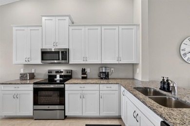 FULL GOLF MEMBERSHIP INCLUDED. PREMIER END UNIT CONDOMINIUM ON on Esplanade Golf and Country at Lakewood Ranch in Florida - for sale on GolfHomes.com, golf home, golf lot