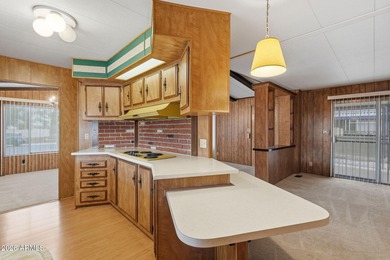 Beautifully positioned with eye-catching curb appeal and ideally on Oakwood Golf Club  in Arizona - for sale on GolfHomes.com, golf home, golf lot