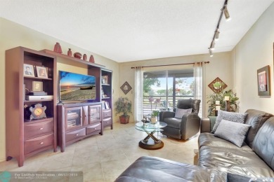 WELL CARED FOR 2/2 ON THE GOLF COURSE W/ LOVELY LAKE VIEW! on Wynmoor Golf Course in Florida - for sale on GolfHomes.com, golf home, golf lot