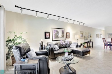 WELL CARED FOR 2/2 ON THE GOLF COURSE W/ LOVELY LAKE VIEW! on Wynmoor Golf Course in Florida - for sale on GolfHomes.com, golf home, golf lot
