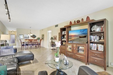 WELL CARED FOR 2/2 ON THE GOLF COURSE W/ LOVELY LAKE VIEW! on Wynmoor Golf Course in Florida - for sale on GolfHomes.com, golf home, golf lot