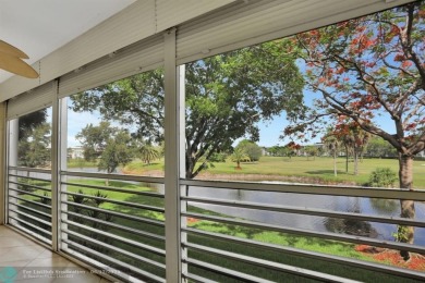 WELL CARED FOR 2/2 ON THE GOLF COURSE W/ LOVELY LAKE VIEW! on Wynmoor Golf Course in Florida - for sale on GolfHomes.com, golf home, golf lot