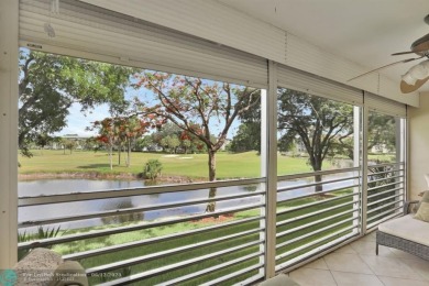 WELL CARED FOR 2/2 ON THE GOLF COURSE W/ LOVELY LAKE VIEW! on Wynmoor Golf Course in Florida - for sale on GolfHomes.com, golf home, golf lot