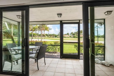 Enjoy serene golf course views from this spacious and on Quail Ridge Golf Course and Country Club in Florida - for sale on GolfHomes.com, golf home, golf lot