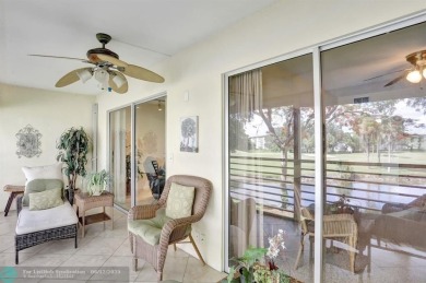 WELL CARED FOR 2/2 ON THE GOLF COURSE W/ LOVELY LAKE VIEW! on Wynmoor Golf Course in Florida - for sale on GolfHomes.com, golf home, golf lot