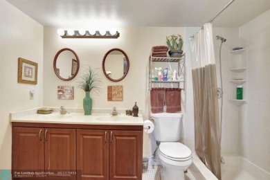 WELL CARED FOR 2/2 ON THE GOLF COURSE W/ LOVELY LAKE VIEW! on Wynmoor Golf Course in Florida - for sale on GolfHomes.com, golf home, golf lot