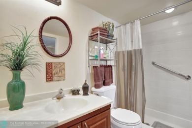 WELL CARED FOR 2/2 ON THE GOLF COURSE W/ LOVELY LAKE VIEW! on Wynmoor Golf Course in Florida - for sale on GolfHomes.com, golf home, golf lot