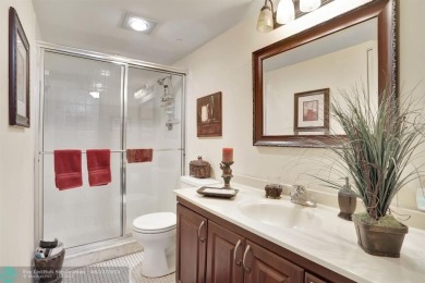 WELL CARED FOR 2/2 ON THE GOLF COURSE W/ LOVELY LAKE VIEW! on Wynmoor Golf Course in Florida - for sale on GolfHomes.com, golf home, golf lot