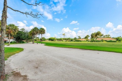 Enjoy serene golf course views from this spacious and on Quail Ridge Golf Course and Country Club in Florida - for sale on GolfHomes.com, golf home, golf lot