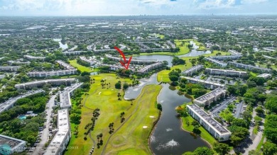 WELL CARED FOR 2/2 ON THE GOLF COURSE W/ LOVELY LAKE VIEW! on Wynmoor Golf Course in Florida - for sale on GolfHomes.com, golf home, golf lot