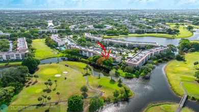 WELL CARED FOR 2/2 ON THE GOLF COURSE W/ LOVELY LAKE VIEW! on Wynmoor Golf Course in Florida - for sale on GolfHomes.com, golf home, golf lot