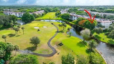 WELL CARED FOR 2/2 ON THE GOLF COURSE W/ LOVELY LAKE VIEW! on Wynmoor Golf Course in Florida - for sale on GolfHomes.com, golf home, golf lot