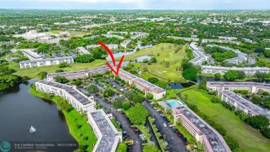 WELL CARED FOR 2/2 ON THE GOLF COURSE W/ LOVELY LAKE VIEW! on Wynmoor Golf Course in Florida - for sale on GolfHomes.com, golf home, golf lot