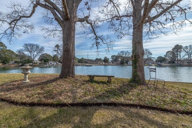 Nestled at the end of a quiet street on Indian Creek, with on Indian Creek Yacht and Country Club in Virginia - for sale on GolfHomes.com, golf home, golf lot