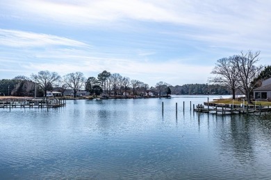 Nestled at the end of a quiet street on Indian Creek, with on Indian Creek Yacht and Country Club in Virginia - for sale on GolfHomes.com, golf home, golf lot