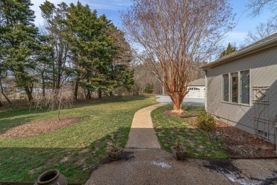 Nestled at the end of a quiet street on Indian Creek, with on Indian Creek Yacht and Country Club in Virginia - for sale on GolfHomes.com, golf home, golf lot