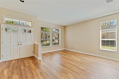 Home near country club amenities o Screened porch outdoor living on Hunters Green Country Club in Florida - for sale on GolfHomes.com, golf home, golf lot