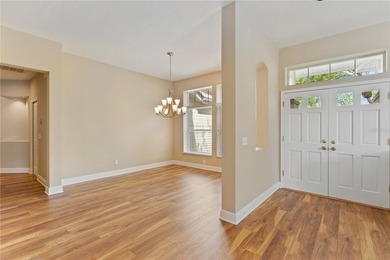 Home near country club amenities o Screened porch outdoor living on Hunters Green Country Club in Florida - for sale on GolfHomes.com, golf home, golf lot