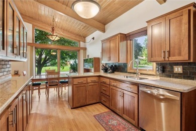 This classic mid-century modern home makes a dramatic statement on Brookview Golf Course - Brookview in Minnesota - for sale on GolfHomes.com, golf home, golf lot