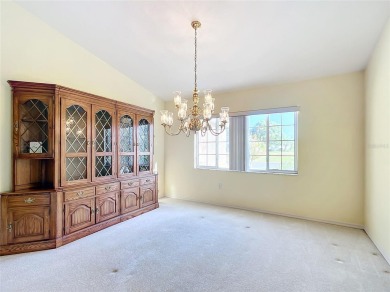 Lovely stucco turn-key 3 bedroom/2 bath, ASPEN style home in on Eagle Ridge At Spruce Creek Country Club in Florida - for sale on GolfHomes.com, golf home, golf lot