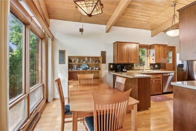 This classic mid-century modern home makes a dramatic statement on Brookview Golf Course - Brookview in Minnesota - for sale on GolfHomes.com, golf home, golf lot