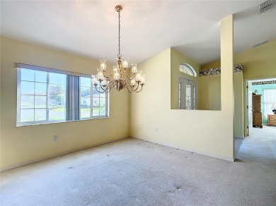 Lovely stucco turn-key 3 bedroom/2 bath, ASPEN style home in on Eagle Ridge At Spruce Creek Country Club in Florida - for sale on GolfHomes.com, golf home, golf lot
