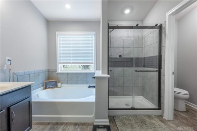 Welcome to this beautifully designed condo nestled along the on Shaker Run Golf Club  in Ohio - for sale on GolfHomes.com, golf home, golf lot