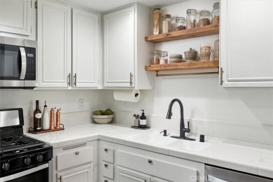 Charming 3-bedroom townhome in the highly sought-after Valencia on Vista Valencia Golf Course in California - for sale on GolfHomes.com, golf home, golf lot