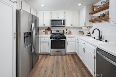 Charming 3-bedroom townhome in the highly sought-after Valencia on Vista Valencia Golf Course in California - for sale on GolfHomes.com, golf home, golf lot