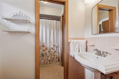 This classic mid-century modern home makes a dramatic statement on Brookview Golf Course - Brookview in Minnesota - for sale on GolfHomes.com, golf home, golf lot