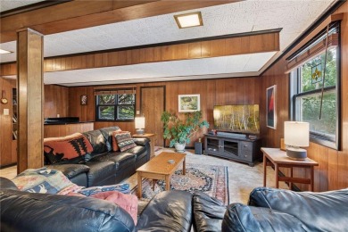 This classic mid-century modern home makes a dramatic statement on Brookview Golf Course - Brookview in Minnesota - for sale on GolfHomes.com, golf home, golf lot