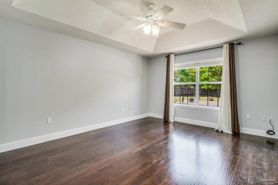 Nestled in a peaceful cul-de-sac, this stunning 4-bedroom, 2 on Tiger Point Golf and Country Club in Florida - for sale on GolfHomes.com, golf home, golf lot