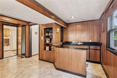 This classic mid-century modern home makes a dramatic statement on Brookview Golf Course - Brookview in Minnesota - for sale on GolfHomes.com, golf home, golf lot