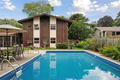 This classic mid-century modern home makes a dramatic statement on Brookview Golf Course - Brookview in Minnesota - for sale on GolfHomes.com, golf home, golf lot
