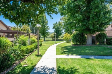 Charming 3-bedroom townhome in the highly sought-after Valencia on Vista Valencia Golf Course in California - for sale on GolfHomes.com, golf home, golf lot