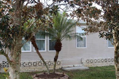 Welcome to this absolutley manicured and gorgeous 3 bedroom 2006 on Schalamar Creek Golf and Country Club in Florida - for sale on GolfHomes.com, golf home, golf lot