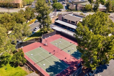 Charming 3-bedroom townhome in the highly sought-after Valencia on Vista Valencia Golf Course in California - for sale on GolfHomes.com, golf home, golf lot