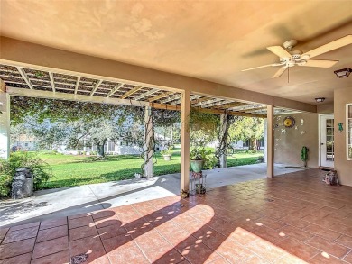 Lovely stucco turn-key 3 bedroom/2 bath, ASPEN style home in on Eagle Ridge At Spruce Creek Country Club in Florida - for sale on GolfHomes.com, golf home, golf lot