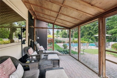 This classic mid-century modern home makes a dramatic statement on Brookview Golf Course - Brookview in Minnesota - for sale on GolfHomes.com, golf home, golf lot