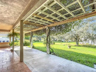 Lovely stucco turn-key 3 bedroom/2 bath, ASPEN style home in on Eagle Ridge At Spruce Creek Country Club in Florida - for sale on GolfHomes.com, golf home, golf lot