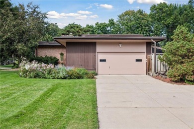 This classic mid-century modern home makes a dramatic statement on Brookview Golf Course - Brookview in Minnesota - for sale on GolfHomes.com, golf home, golf lot