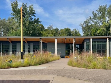This classic mid-century modern home makes a dramatic statement on Brookview Golf Course - Brookview in Minnesota - for sale on GolfHomes.com, golf home, golf lot