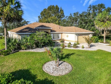Lovely stucco turn-key 3 bedroom/2 bath, ASPEN style home in on Eagle Ridge At Spruce Creek Country Club in Florida - for sale on GolfHomes.com, golf home, golf lot