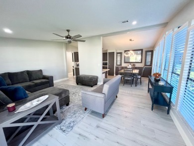Welcome to this beautifully maintained two-bedroom, two-bath on Lake Fairways Country Club in Florida - for sale on GolfHomes.com, golf home, golf lot